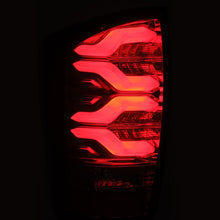 Load image into Gallery viewer, AlphaRex 16-23 Toyota Tacoma PRO-Series LED Tail Lights Jet Black
