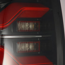 Load image into Gallery viewer, AlphaRex 16-23 Toyota Tacoma LUXX-Series LED Tail Lights Black-Red
